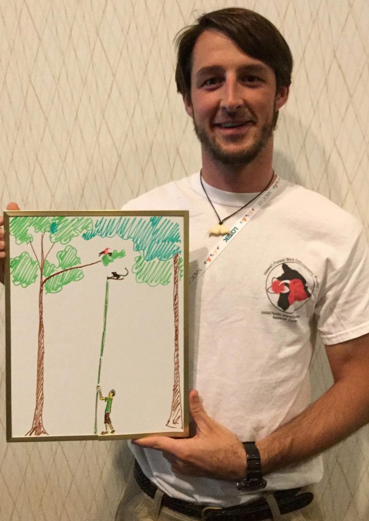 George Cummins studies how Hawaiian birds respond to predators.