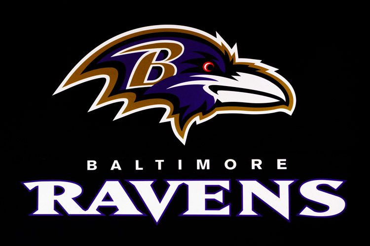Baltimore Ravens team logo with a stylized purple raven head above the team name on a black background.